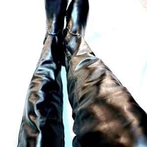 Thigh high soft  Genuine Leather boots with inch and a half stack heel.